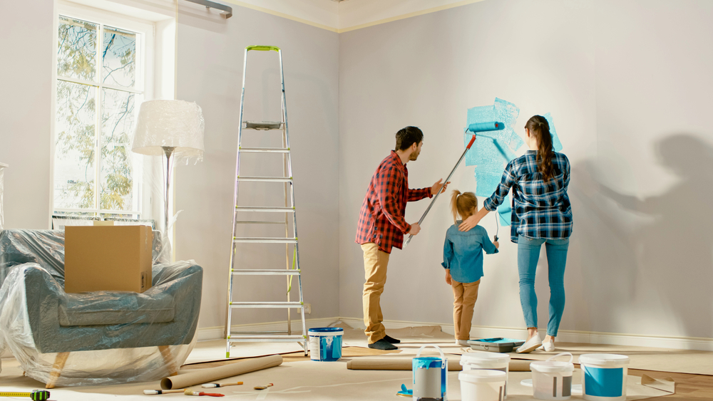 Home Family painting a room